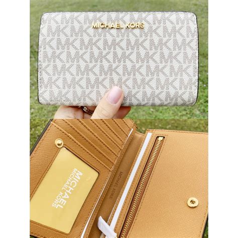 fake michael kors jet set wallet|michael kors vanilla jet set.